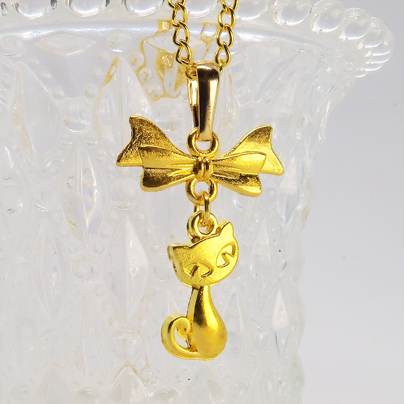 ゴールドカラーの猫とリボンのシンプルで可愛いネックレス 長さ変更可 SV925 18KGC変更可 アジャスター可