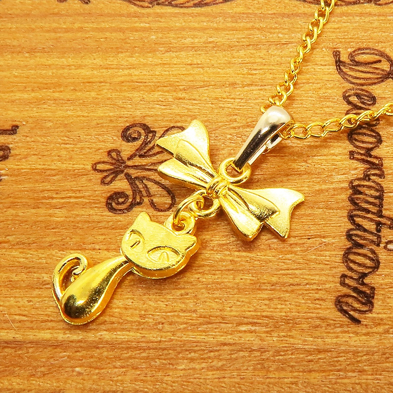 ゴールドカラーの猫とリボンのシンプルで可愛いネックレス 長さ変更可 SV925 18KGC変更可 アジャスター可