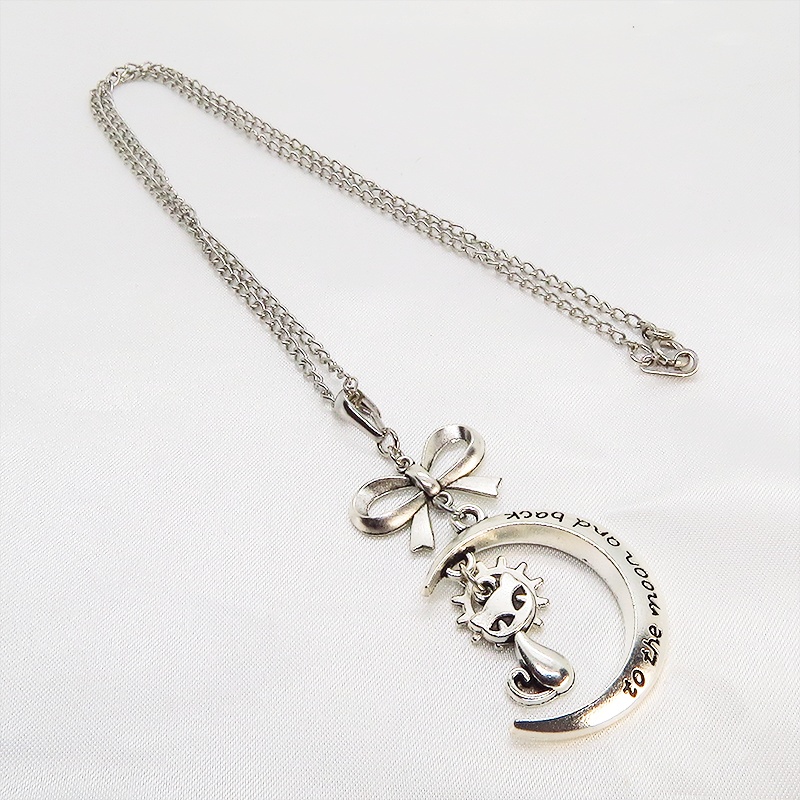 シルバーカラーの猫と三日月の大人可愛いネックレス 大きめリボン 銀古美 アンティーク ムーン