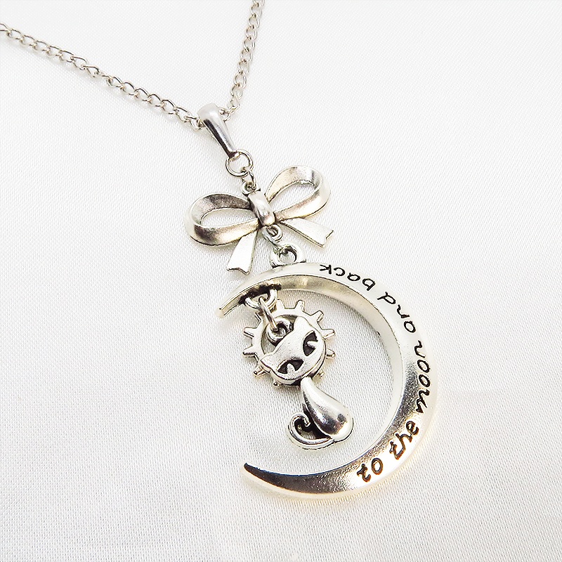 シルバーカラーの猫と三日月の大人可愛いネックレス 大きめリボン 銀古美 アンティーク ムーン