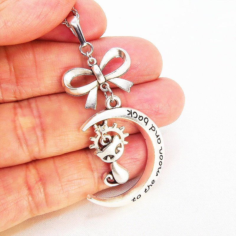 シルバーカラーの猫と三日月の大人可愛いネックレス 大きめリボン 銀古美 アンティーク ムーン