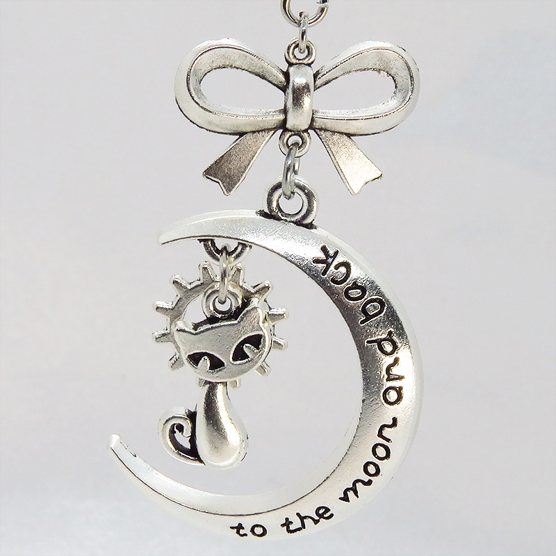 シルバーカラーの猫と三日月の大人可愛いネックレス 大きめリボン 銀古美 アンティーク ムーン