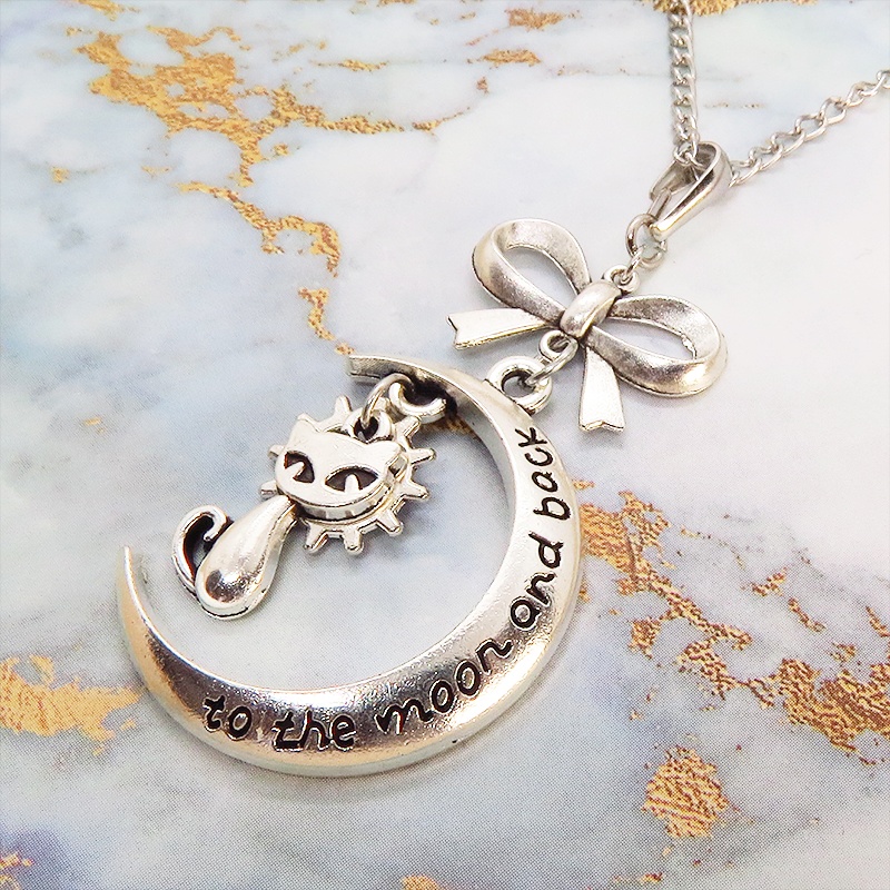 シルバーカラーの猫と三日月の大人可愛いネックレス 大きめリボン 銀古美 アンティーク ムーン