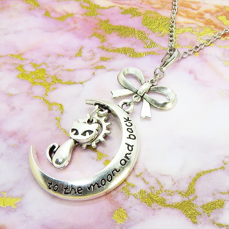 シルバーカラーの猫と三日月の大人可愛いネックレス 大きめリボン 銀古美 アンティーク ムーン
