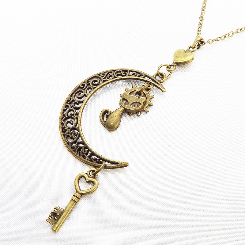 アンティークゴールド 猫とアラベスク調の透かし三日月を組合せたネックレス ハート 鍵 ムーン 大人可愛い アジャスター付