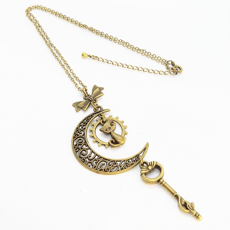 アンティークゴールド 猫とアラベスク調の透かし三日月を組合せたネックレス ハート 猫つき鍵 ムーン 長さ調整可 アジャスター付