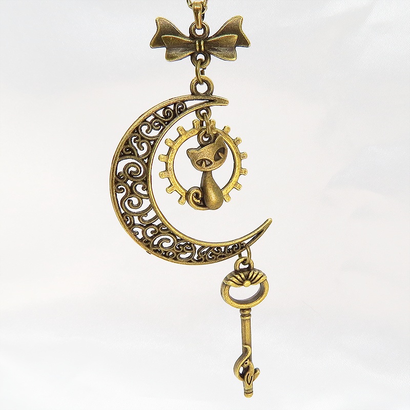 アンティークゴールド 猫とアラベスク調の透かし三日月を組合せたネックレス ハート 猫つき鍵 ムーン 長さ調整可 アジャスター付