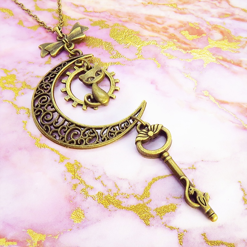 アンティークゴールド 猫とアラベスク調の透かし三日月を組合せたネックレス ハート 猫つき鍵 ムーン 長さ調整可 アジャスター付