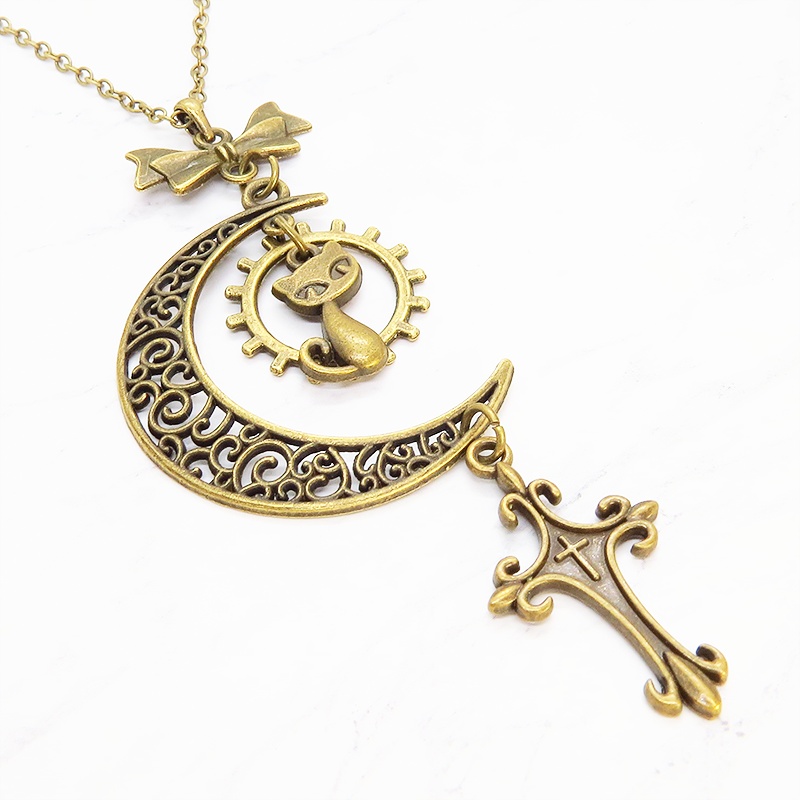 アンティークゴールド 猫とアラベスク調の透かし三日月のネックレス ロザリオ リボン ムーン アジャスター付 アジャスター付