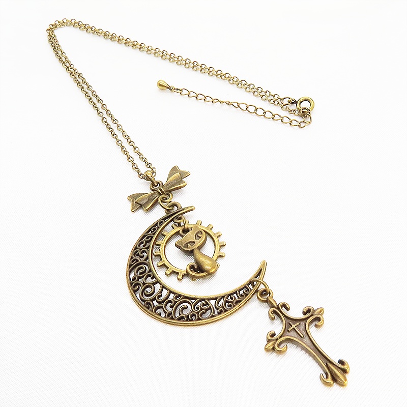 アンティークゴールド 猫とアラベスク調の透かし三日月のネックレス ロザリオ リボン ムーン アジャスター付 アジャスター付