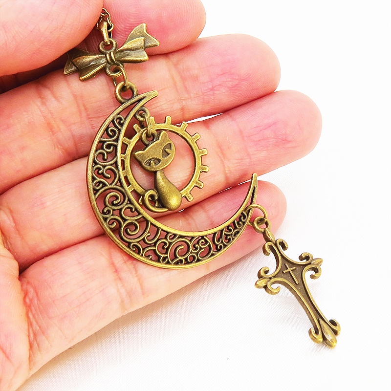 アンティークゴールド 猫とアラベスク調の透かし三日月のネックレス ロザリオ リボン ムーン アジャスター付 アジャスター付