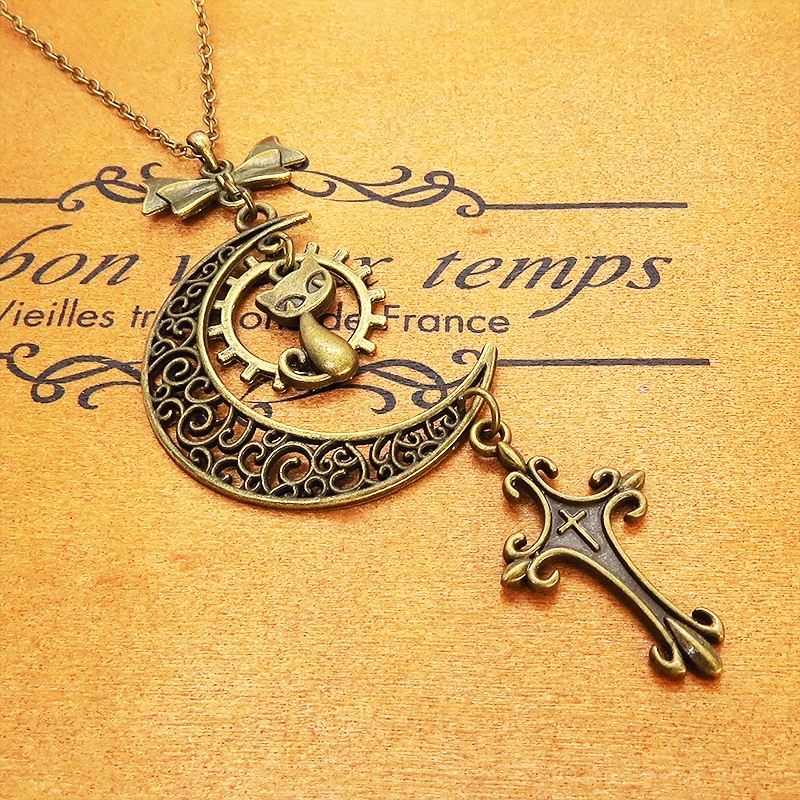 アンティークゴールド 猫とアラベスク調の透かし三日月のネックレス ロザリオ リボン ムーン アジャスター付 アジャスター付