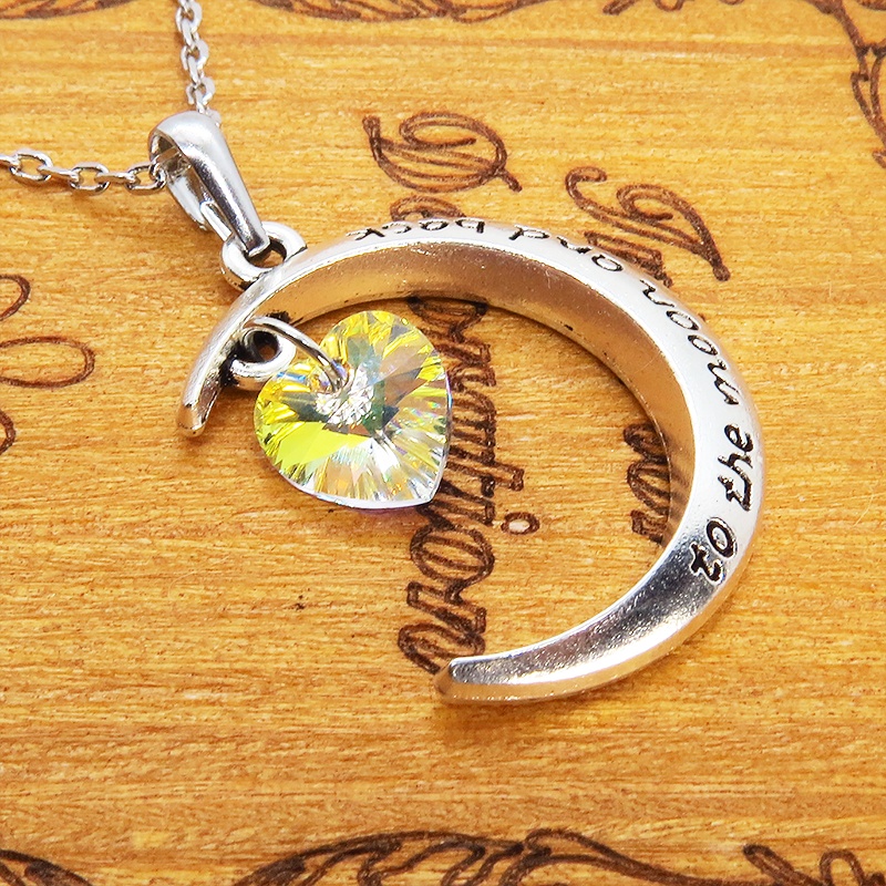 アンティークシルバーの三日月とハート型の大粒スワロフスキーのネックレス クリスタルオーロラ 長さ変更可 アジャスター可