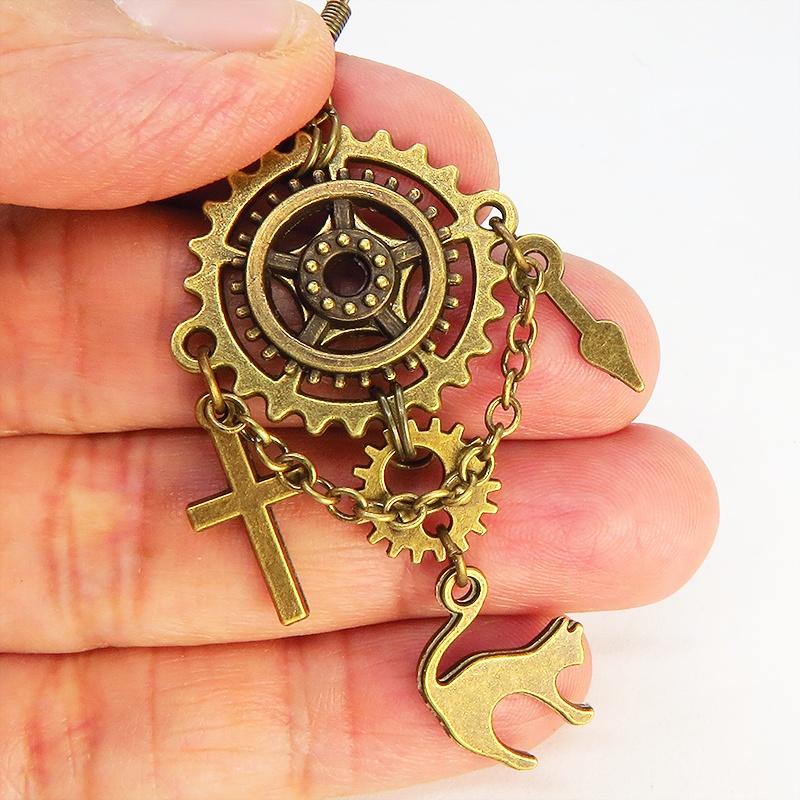 アンティーク調の跳ね猫と歯車・ギアのピアス スチームパンク風 チェーン付き ロザリオ 時計の針
