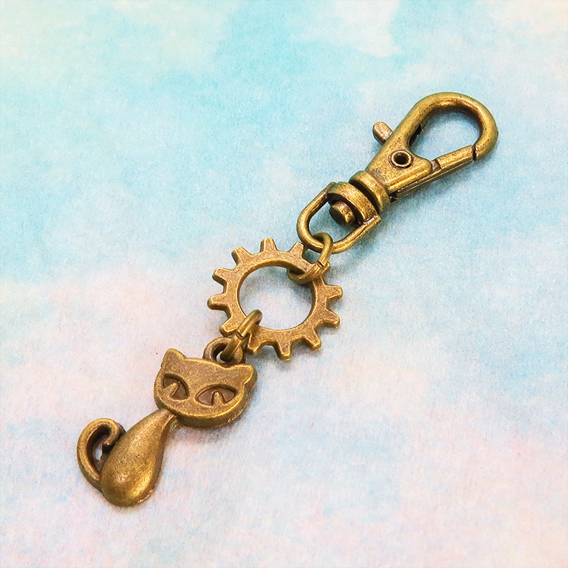 アンティークゴールド 猫と歯車のコンパクトなファスナーチャーム キーホルダー バッグチャーム スチームパンク風