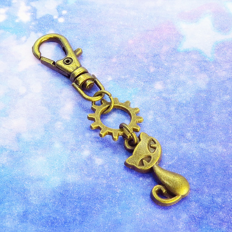 アンティークゴールド 猫と歯車のコンパクトなファスナーチャーム キーホルダー バッグチャーム スチームパンク風