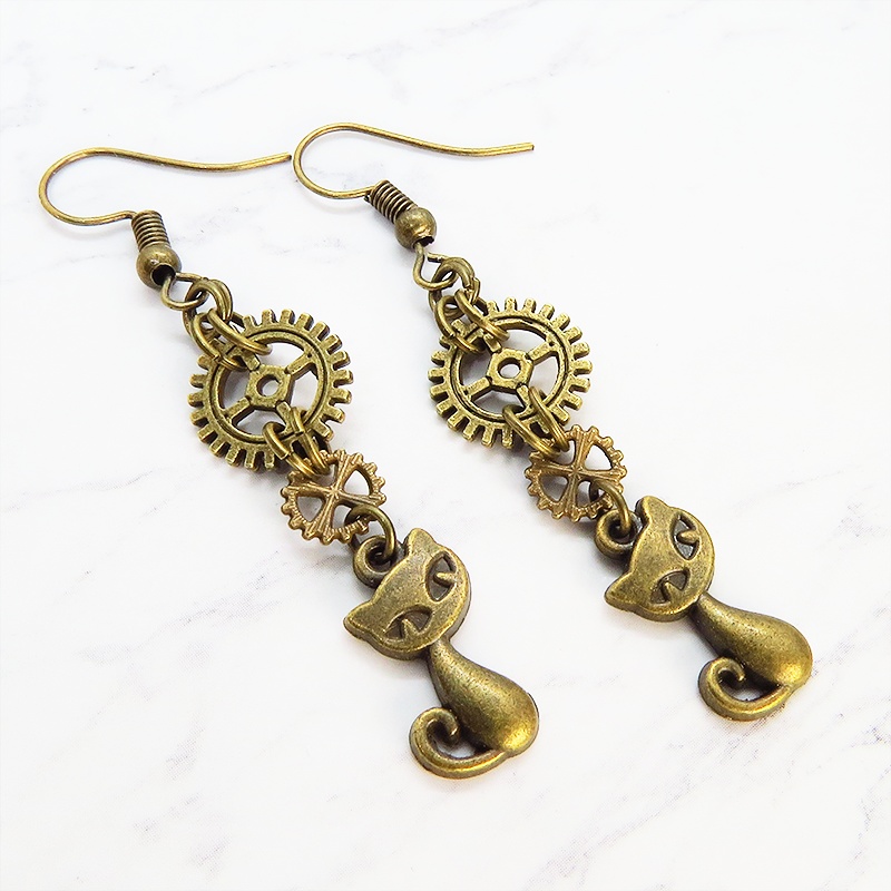 アンティークゴールド スチームパンク風の猫と歯車・ギアを組合せた大人可愛いピアス