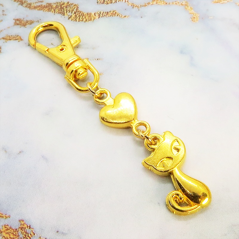 ゴールドカラーのかわいい猫のファスナーチャーム キーホルダー イエローゴールド
