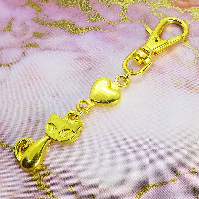ゴールドカラーのかわいい猫のファスナーチャーム キーホルダー イエローゴールド