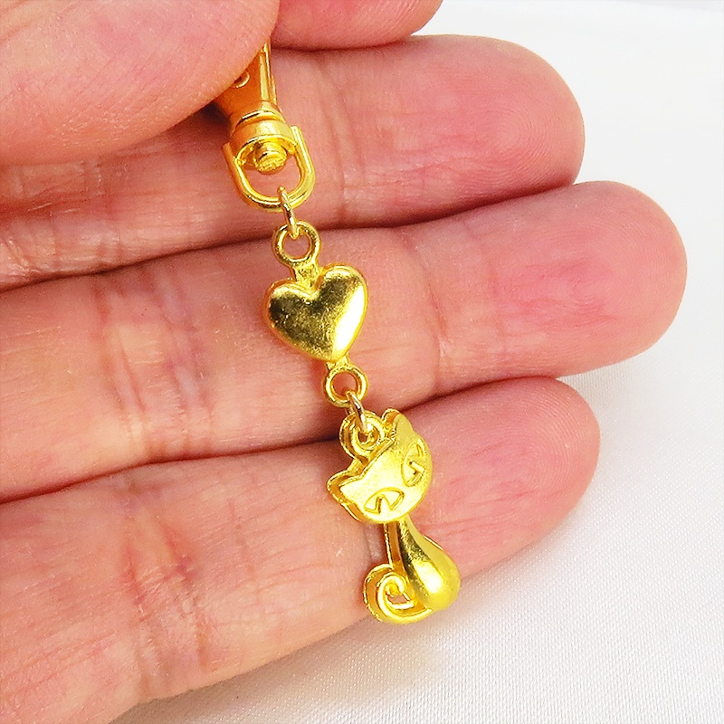 ゴールドカラーのかわいい猫のファスナーチャーム キーホルダー イエローゴールド