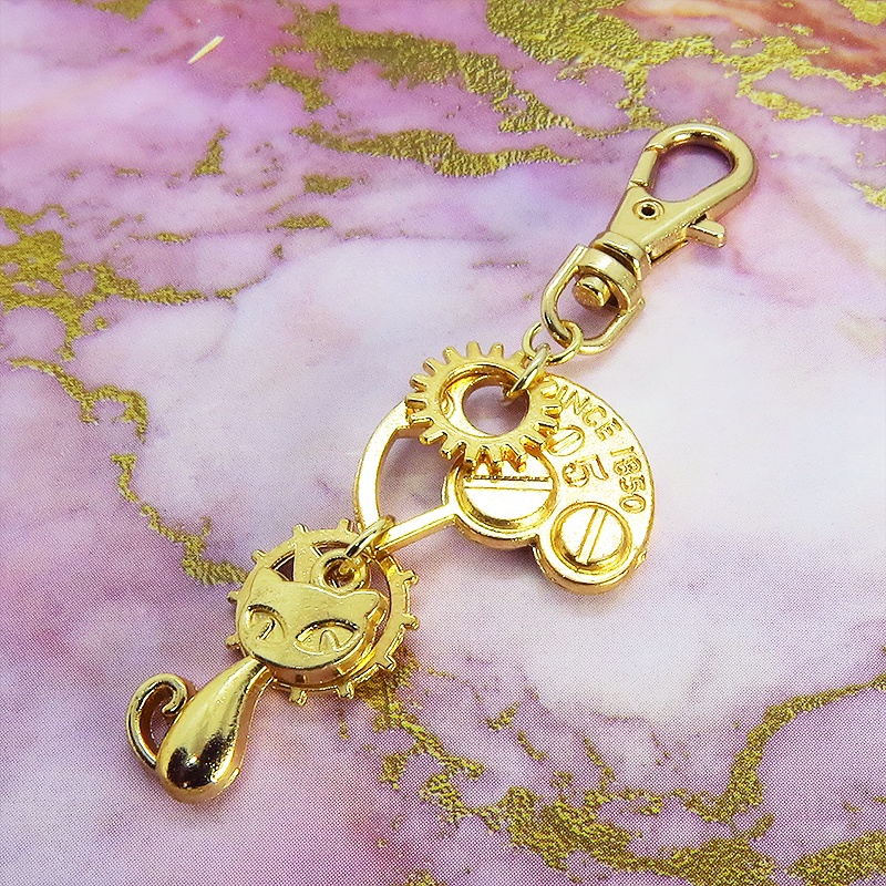 マットゴールドの猫と歯車・ギア ファスナーチャーム キーホルダー スチームパンク にゃお