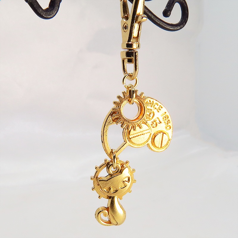 マットゴールドの猫と歯車・ギア ファスナーチャーム キーホルダー スチームパンク にゃお