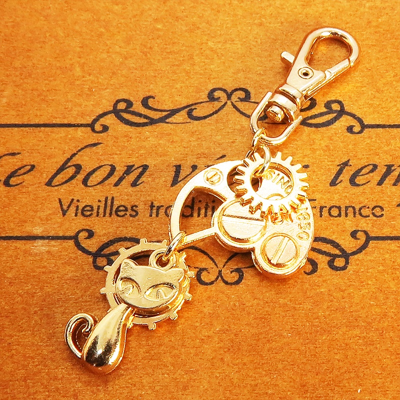 マットゴールドの猫と歯車・ギア ファスナーチャーム キーホルダー スチームパンク にゃお