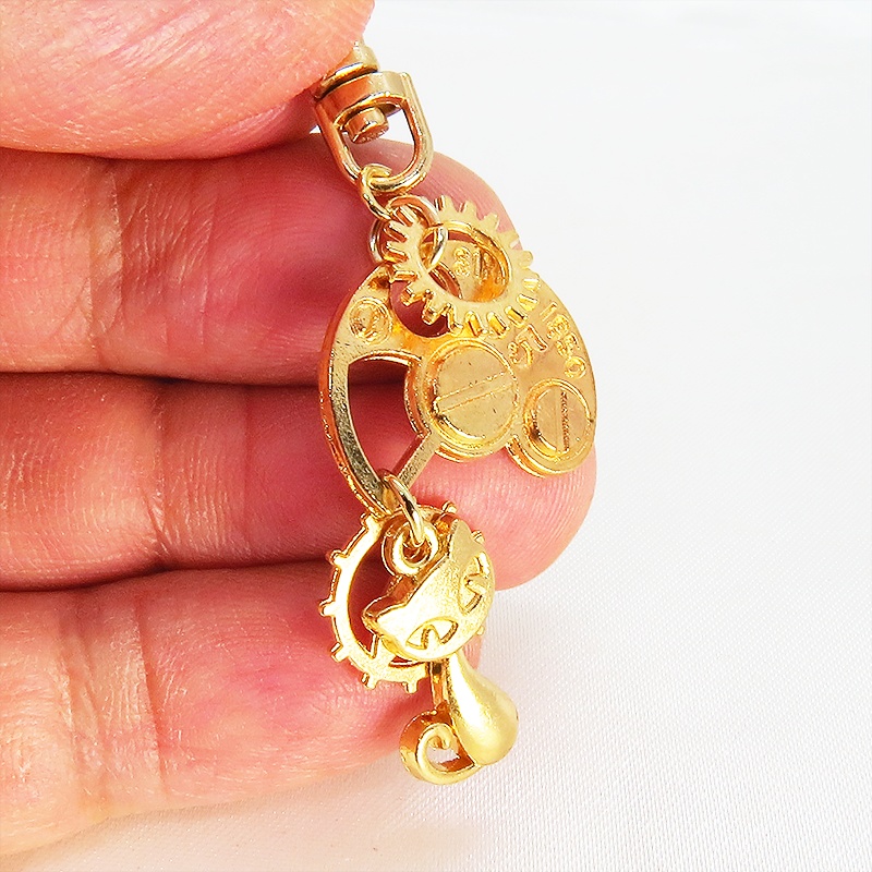 マットゴールドの猫と歯車・ギア ファスナーチャーム キーホルダー スチームパンク にゃお