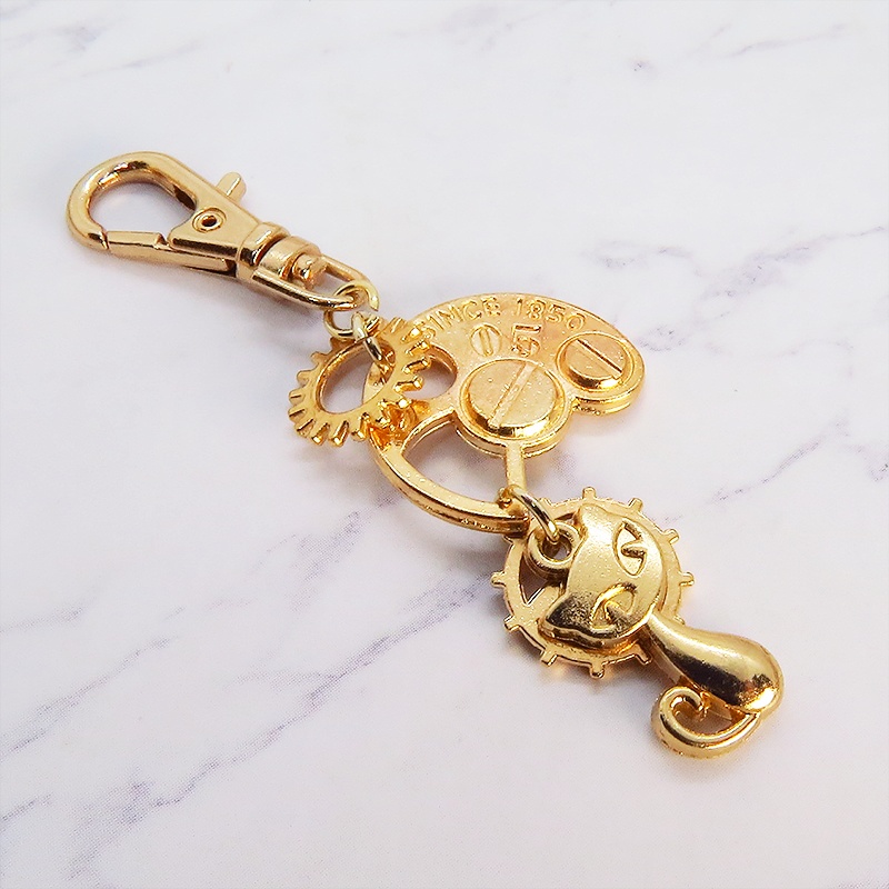 マットゴールドの猫と歯車・ギア ファスナーチャーム キーホルダー スチームパンク にゃお