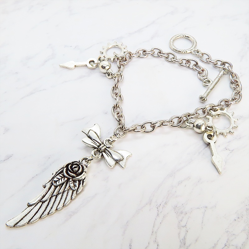 アンティークシルバー 翼と歯車のスチームパンク風ブレスレット リボン 時計の針 メンズ レディース