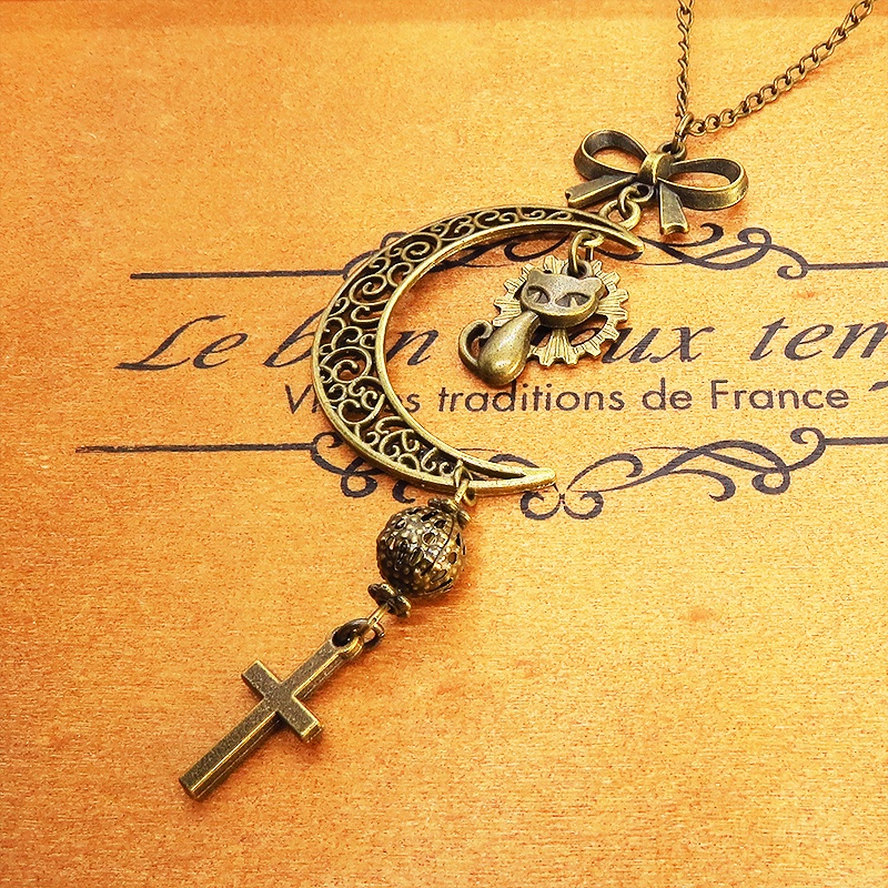 アンティークゴールド 猫と三日月のネックレス ロザリオ リボン メタルビーズ 透かし アラベスク 長さ調整可 アジャスター可