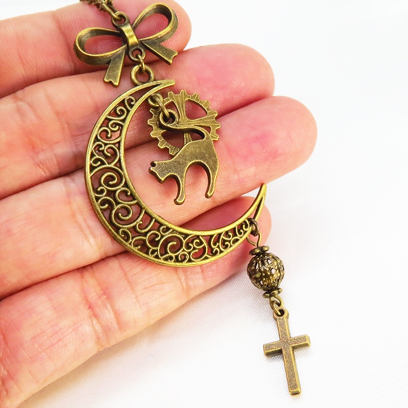 アンティークゴールド 跳ね猫と三日月のネックレス ロザリオ リボン メタルビーズ 透かし アラベスク 長さ調整可 アジャスター可