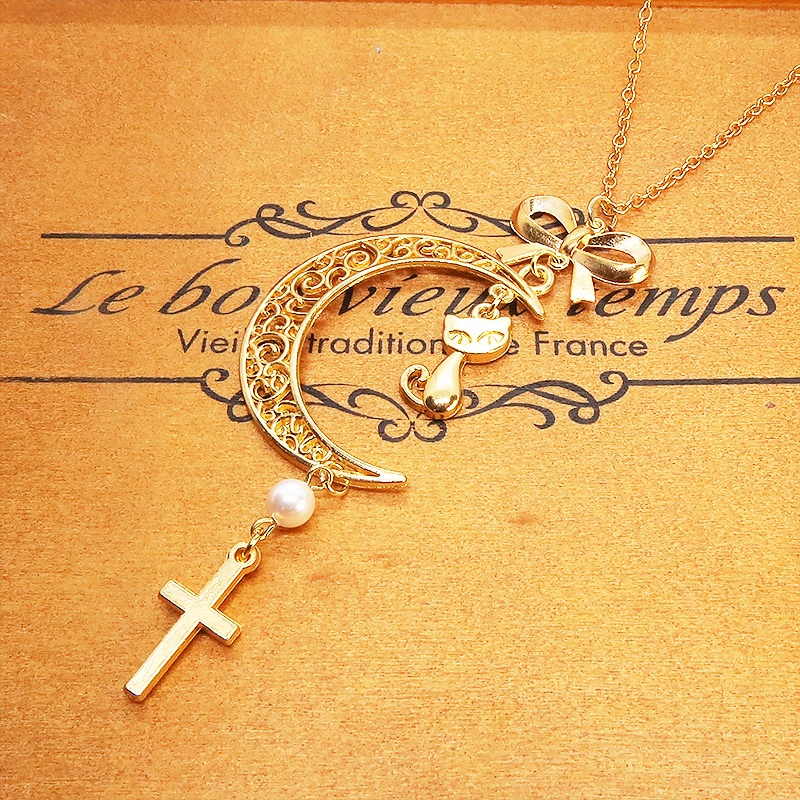 マットゴールド 猫とアラベスク調透かし入りの三日月のネックレス スワロフスキーパール ロザリオ リボン 長さ調整可