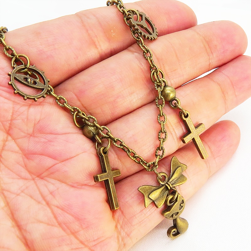 スチームパンク風 猫とロザリオのブレスレット アンティークカラー 歯車・ギア リボン