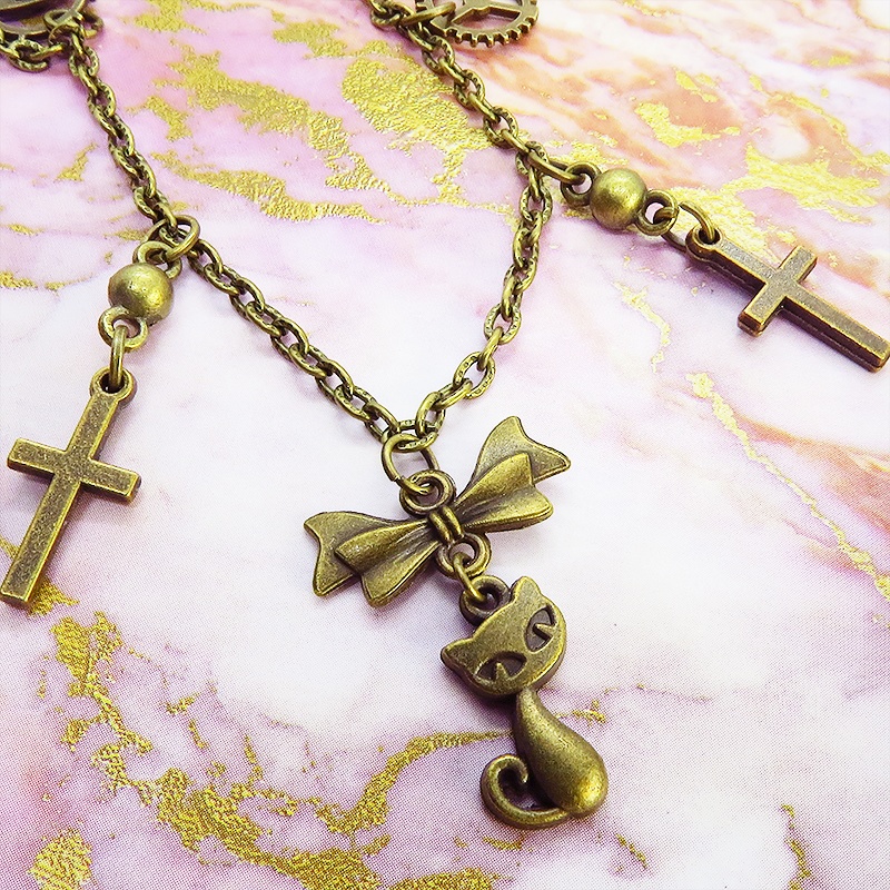 スチームパンク風 猫とロザリオのブレスレット アンティークカラー 歯車・ギア リボン