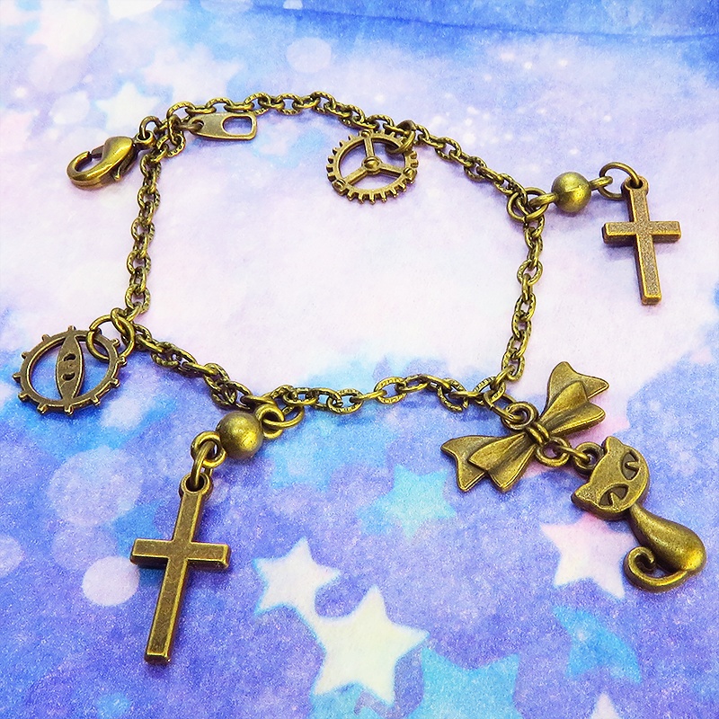 スチームパンク風 猫とロザリオのブレスレット アンティークカラー 歯車・ギア リボン