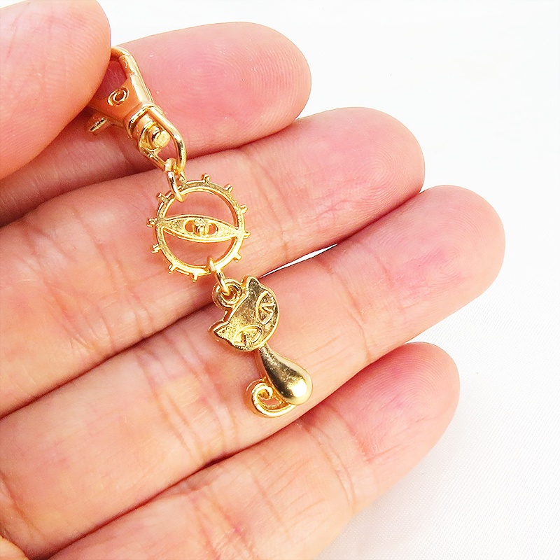 マットゴールドに輝く猫と歯車のシンプルに可愛いファスナーチャーム キーホルダー マスクチャーム