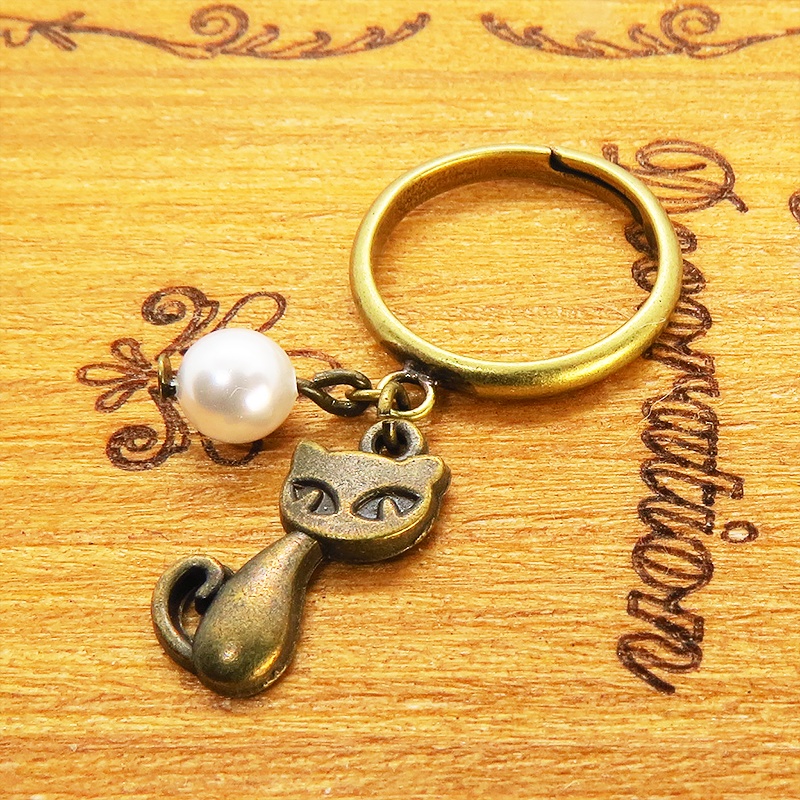 アンティークゴールド 猫とスワロフスキーパールの大人可愛いリング 指輪 フリーサイズ ピンキーリング