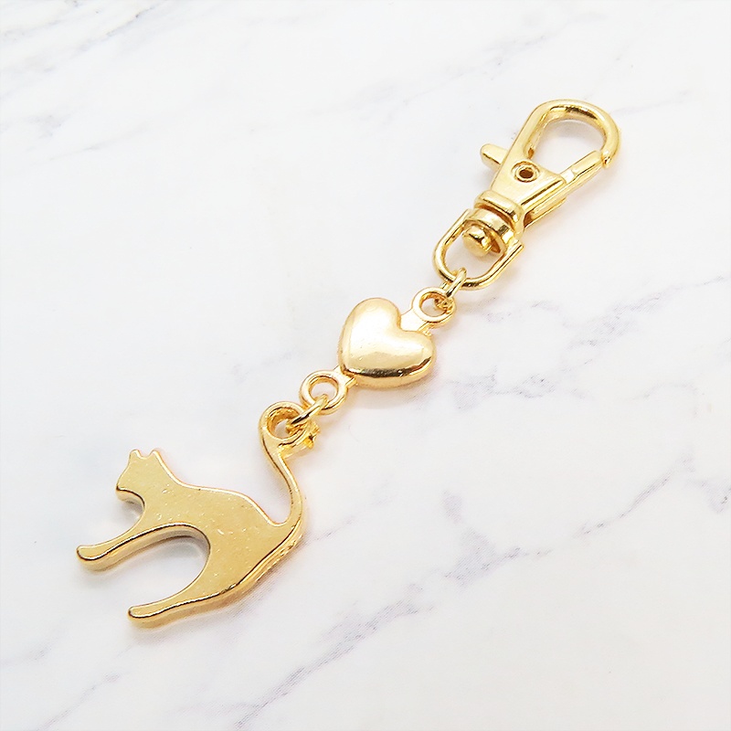 マットゴールドの跳ね猫とハートの大人可愛いファスナーチャーム キーホルダー マスクチャーム