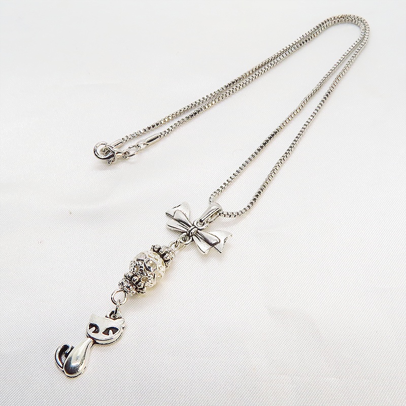 アンティークシルバー 猫とリボンのネックレス ガラス入りメタルビーズ ベネチアンチェーン アジャスター可