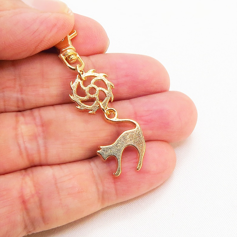 マットゴールドの跳ね猫とちょっとかっこいい歯車の大人可愛いファスナーチャーム キーホルダー マスクチャーム