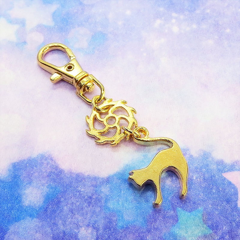 マットゴールドの跳ね猫とちょっとかっこいい歯車の大人可愛いファスナーチャーム キーホルダー マスクチャーム