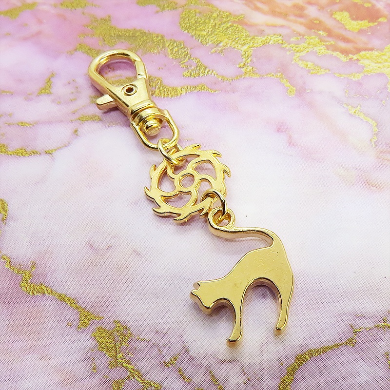 マットゴールドの跳ね猫とちょっとかっこいい歯車の大人可愛いファスナーチャーム キーホルダー マスクチャーム