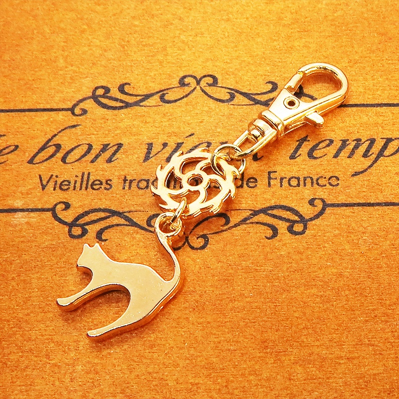 マットゴールドの跳ね猫とちょっとかっこいい歯車の大人可愛いファスナーチャーム キーホルダー マスクチャーム