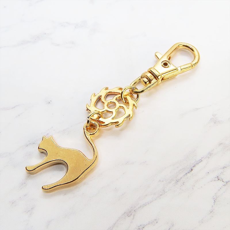 マットゴールドの跳ね猫とちょっとかっこいい歯車の大人可愛いファスナーチャーム キーホルダー マスクチャーム