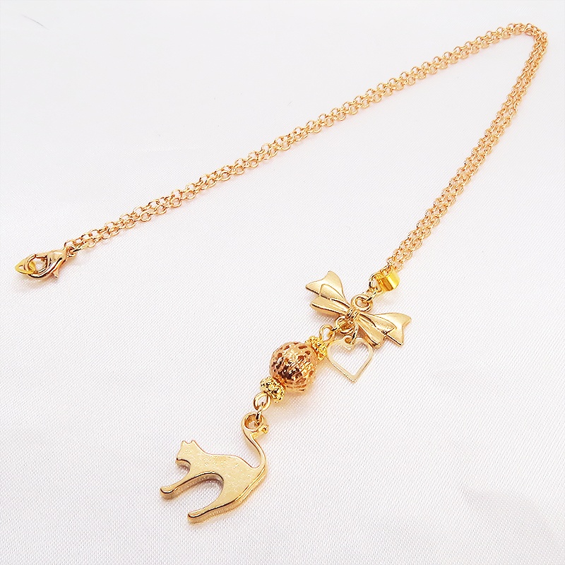 マットゴールド 跳ね猫とリボンネックレス メタルビーズ 長さ調整可 ステンレス可 アジャスター追加可