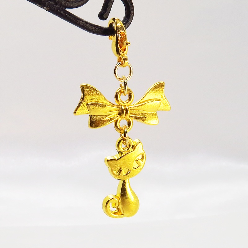 マスク・スマホチャーム ゴールドカラー 猫モチーフとリボンのコンパクトで可愛いチャーム ジャックピン追加可