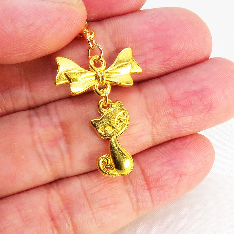 マスク・スマホチャーム ゴールドカラー 猫モチーフとリボンのコンパクトで可愛いチャーム ジャックピン追加可