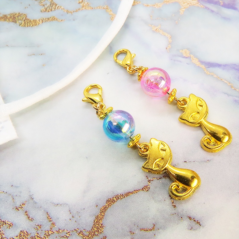 マスク・スマホチャーム ゴールドカラー 猫モチーフと透き通るアクアマリンビーズのチャーム 金具変更可 ジャックピン追加可