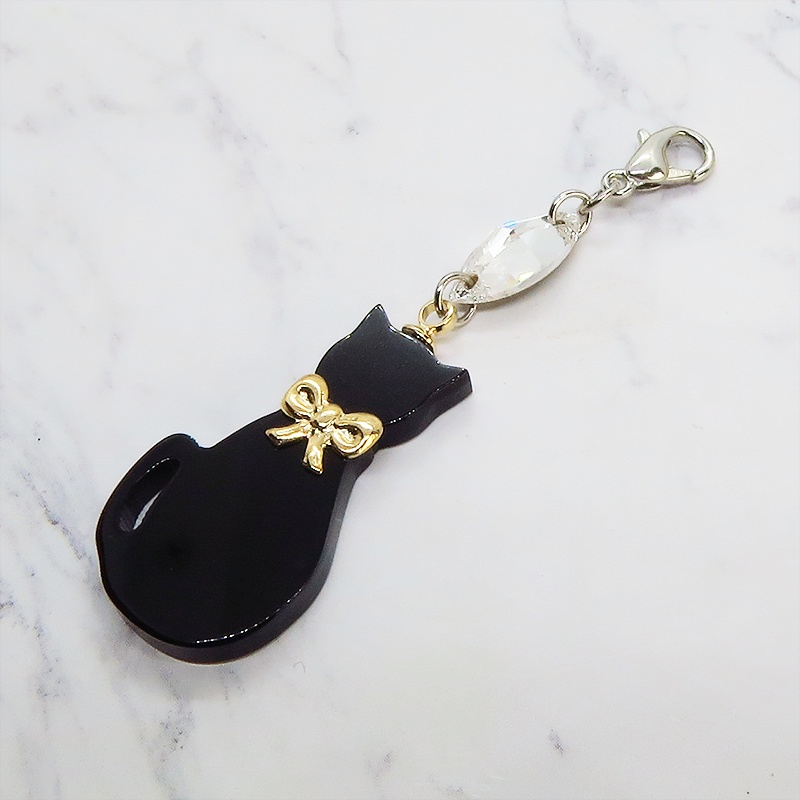 マスクチャーム ゴールドリボンの黒猫チャームとスワロフスキーのチャーム アクリル キーホルダー